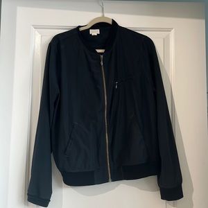 Womens Black bomber jacket with gold zipper details